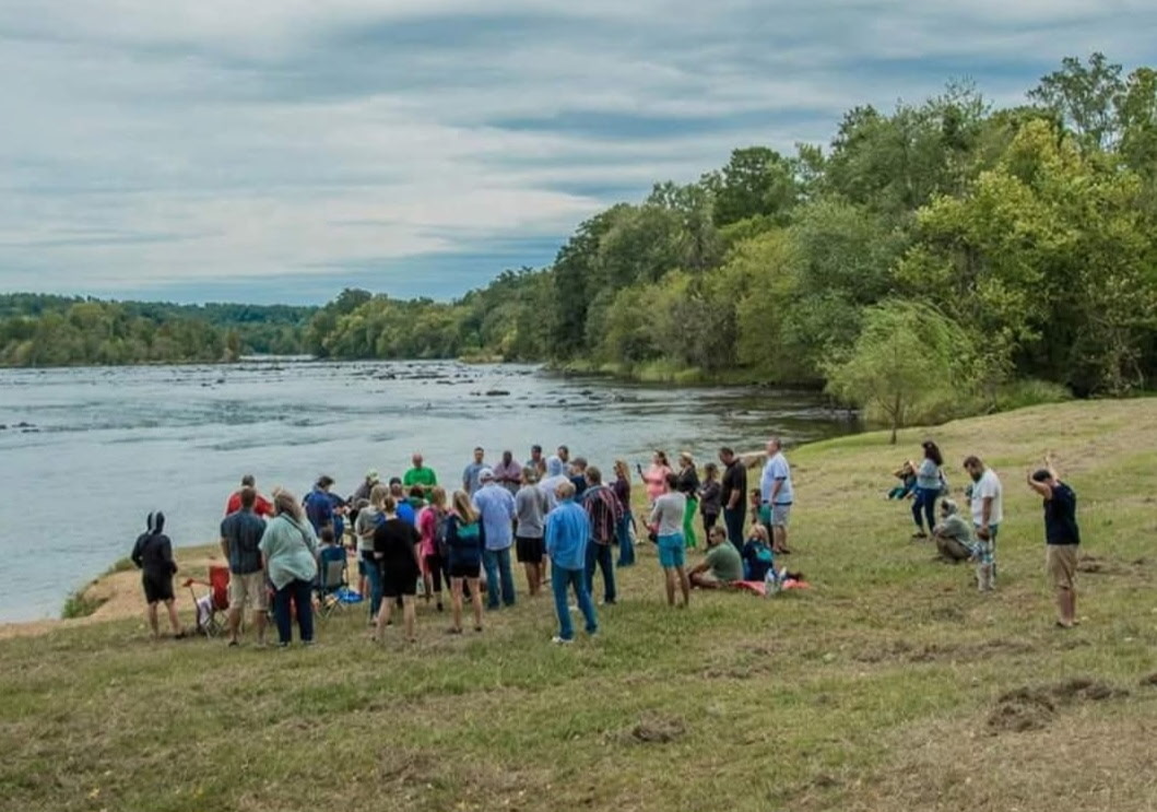 Congregation by the river